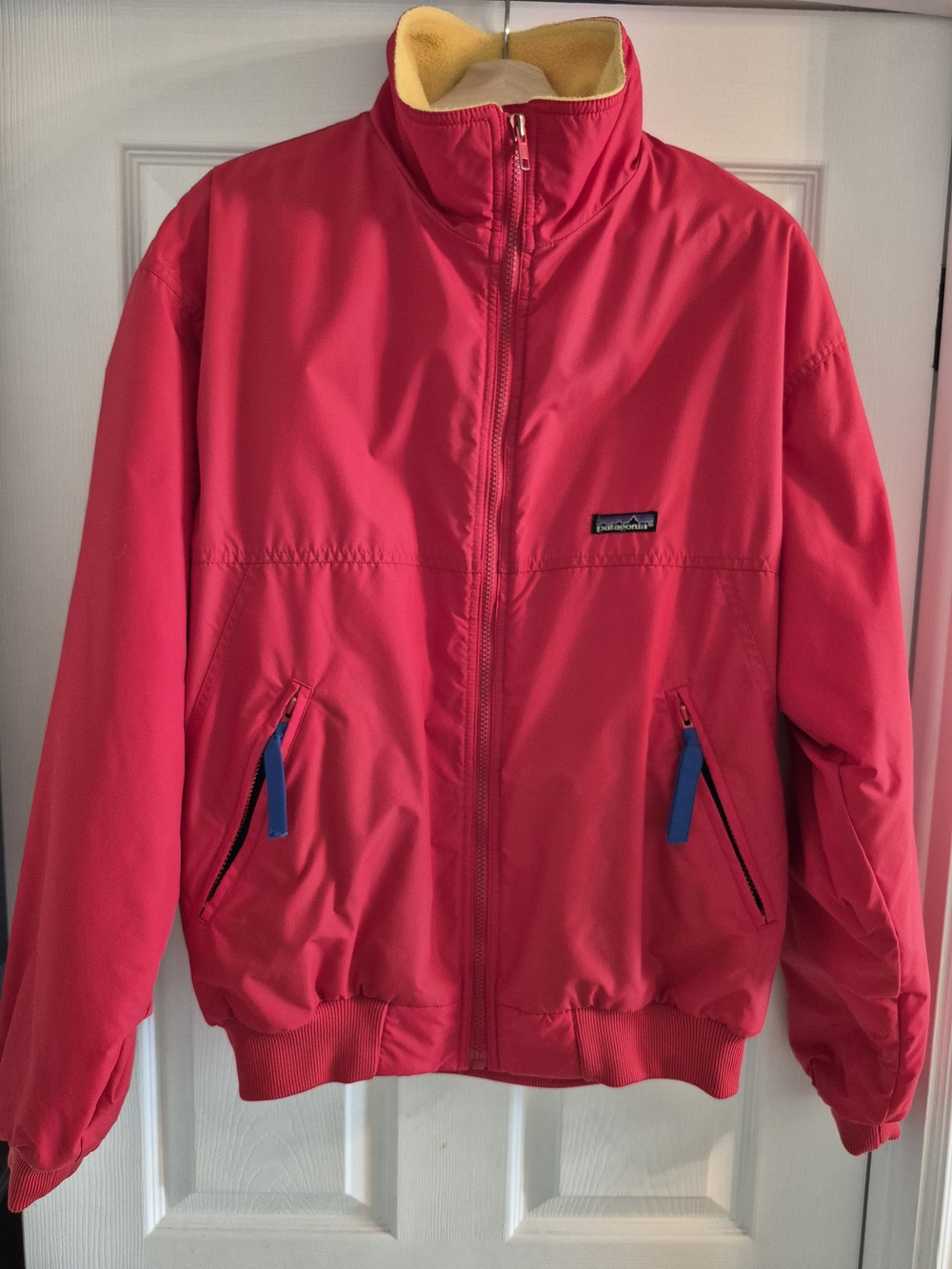 Vintage red Patagonia Men's Bomber Jacket with Yellow Fleece Lining
